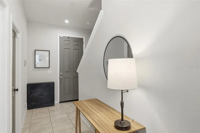 a picture of a bathroom with a sink and a mirror