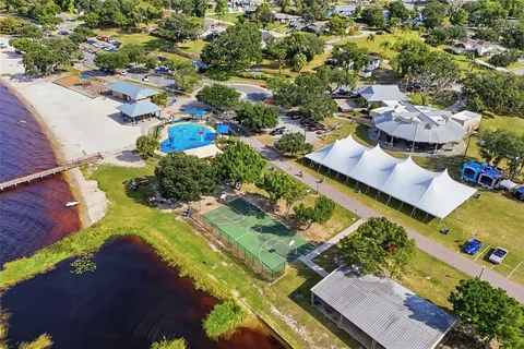 an aerial view of residential house with outdoor space and swimming pool