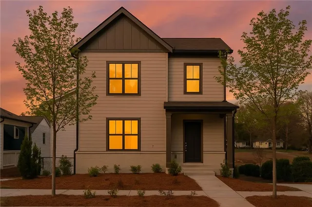 a view of a house with street and chairs