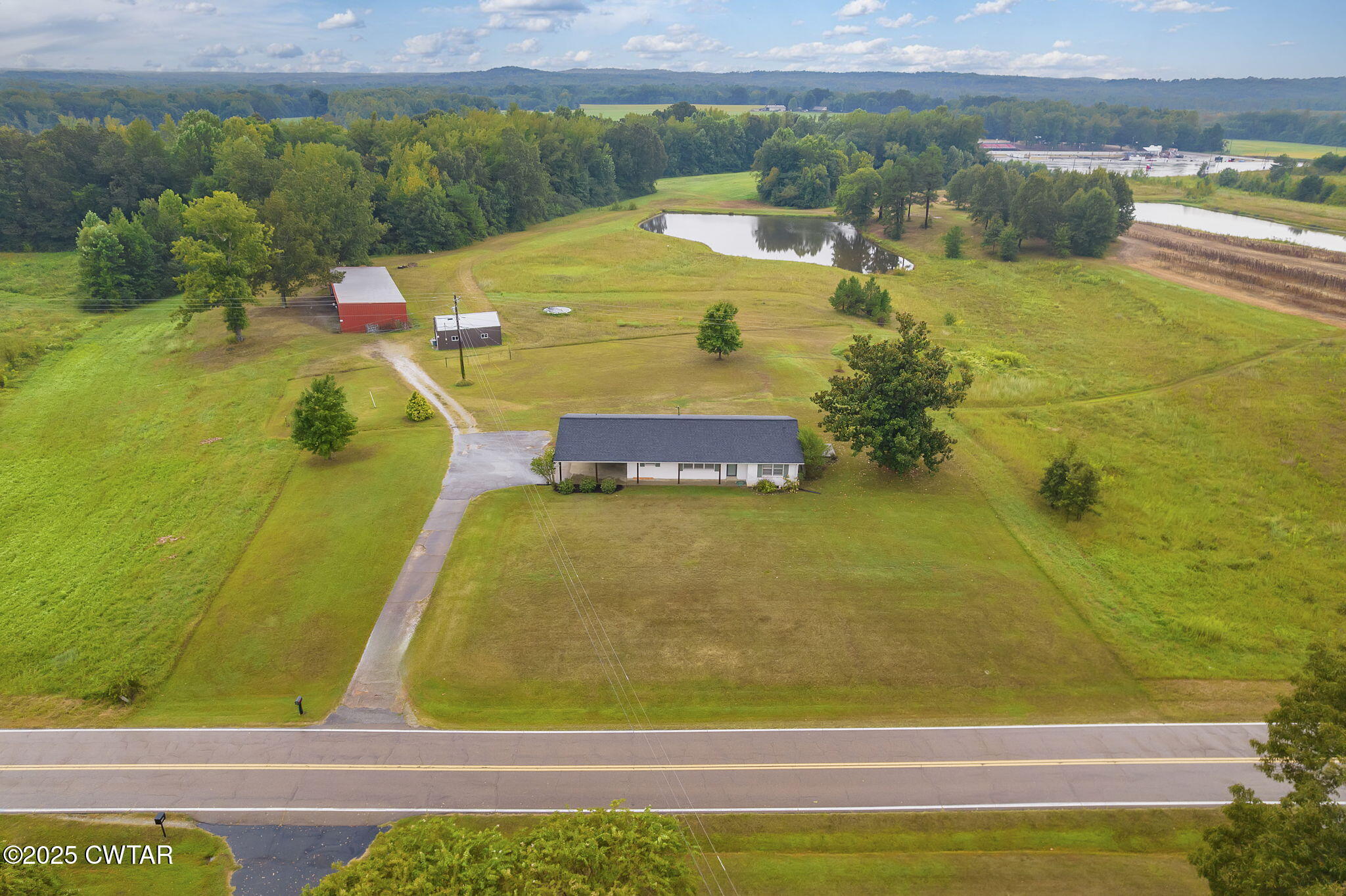 3810 Beech Bluff Road Jackson, TN 38301 - Photo 20 of 24 a view of a swimming pool with seating area