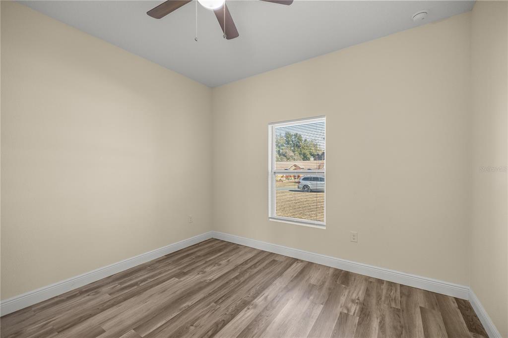 13745 Southwest 43rd Circle Ocala, FL 34473 - Photo 16 of 25 an empty room with a window