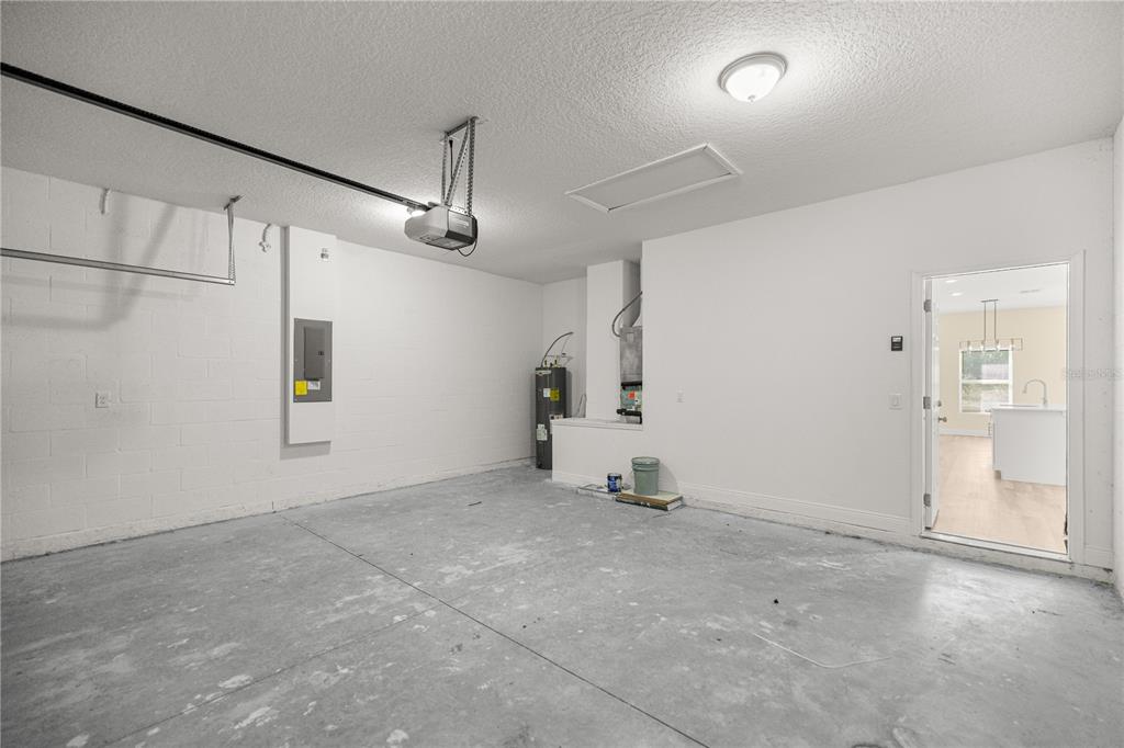 13745 Southwest 43rd Circle Ocala, FL 34473 - Photo 21 of 25 en empty room with ceiling fan and windows