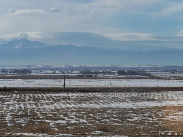a view of building with ocean