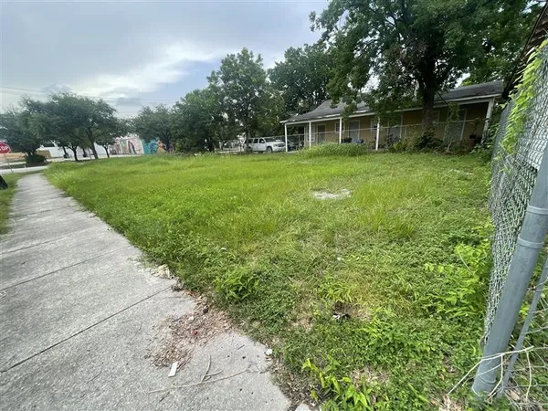 a view of an buildings with a tree