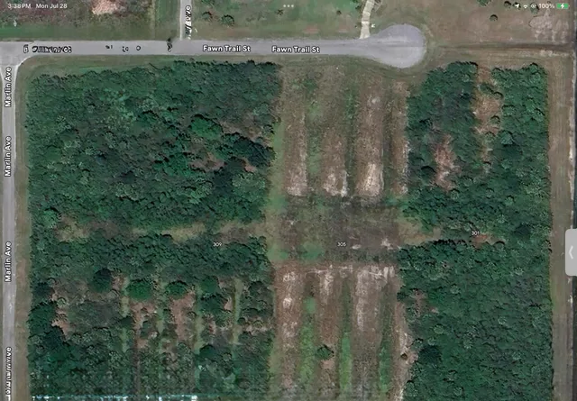 a sign on a wall next to a building