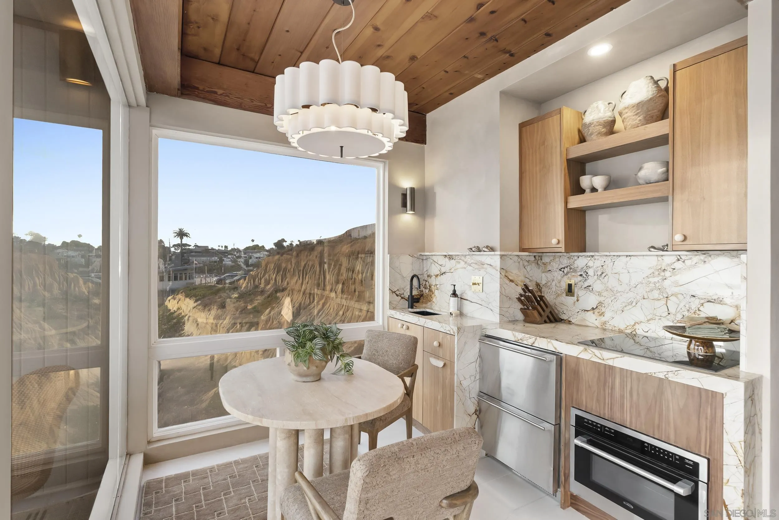 430 Moonlight Lane Encinitas, CA 92024 - Photo 15 of 28 a view of a kitchen area with furniture and a kitchen view