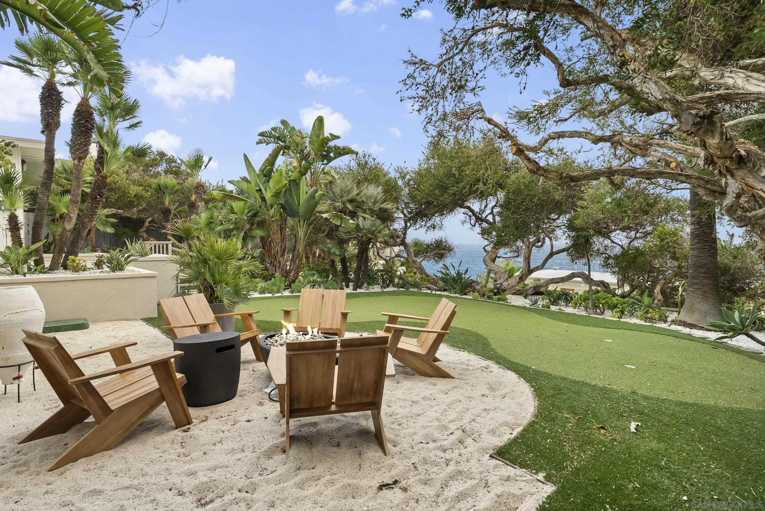 430 Moonlight Lane Encinitas, CA 92024 - Photo 19 of 28 a view of a backyard with sitting area