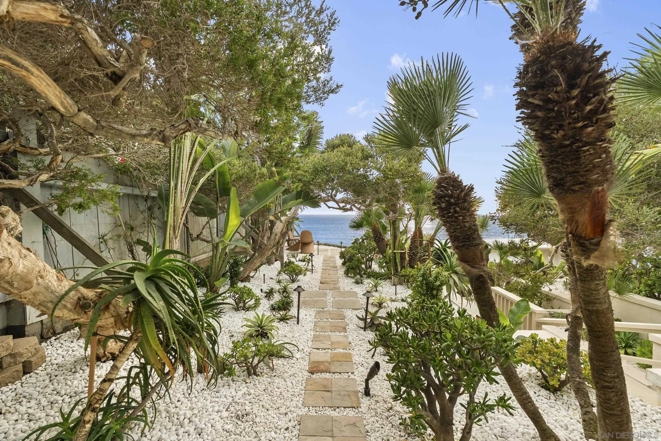 430 Moonlight Lane Encinitas, CA 92024 - Photo 25 of 28 a view of a yard with plants and trees