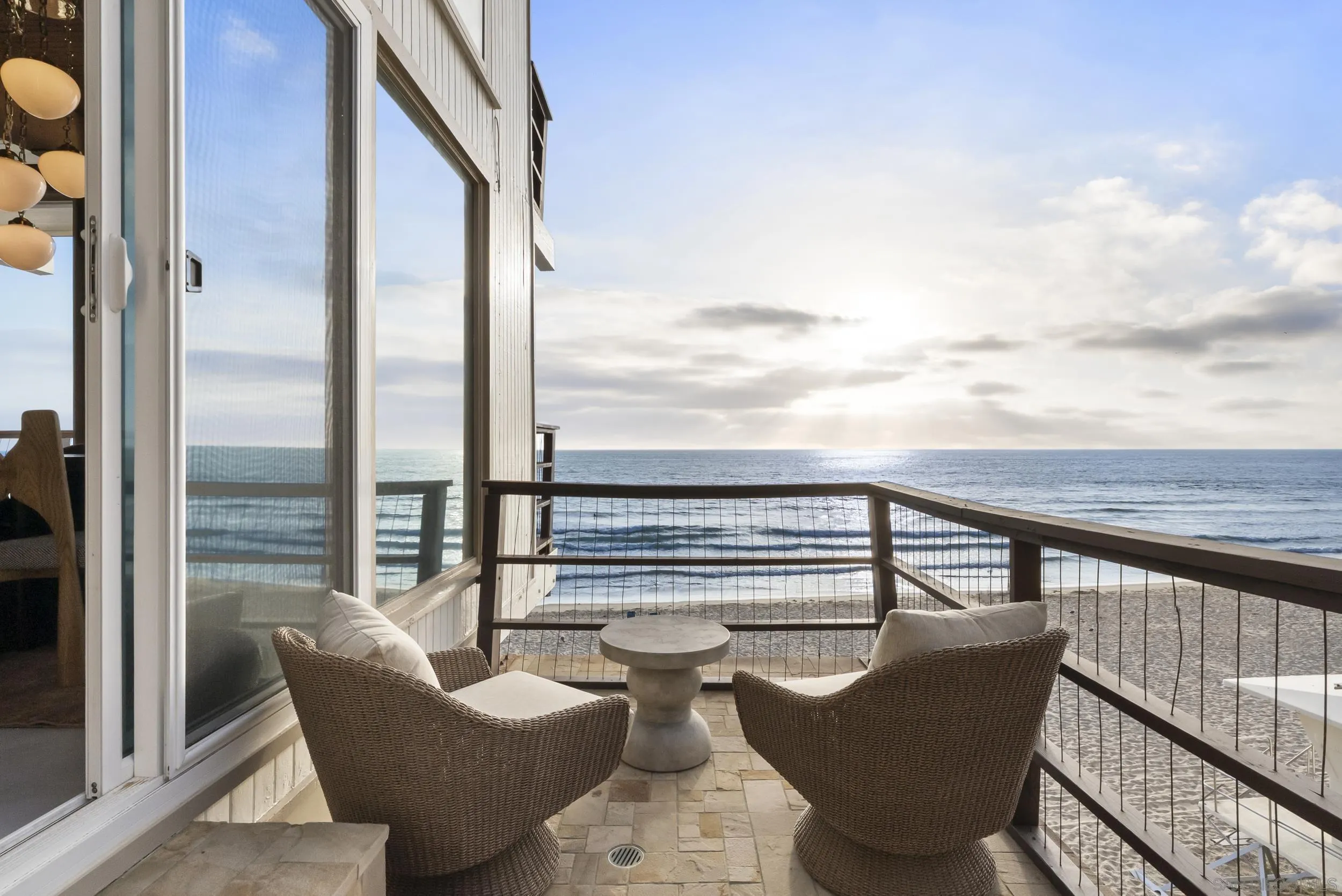 430 Moonlight Lane Encinitas, CA 92024 - Photo 7 of 28 a view of balcony with couch and chairs