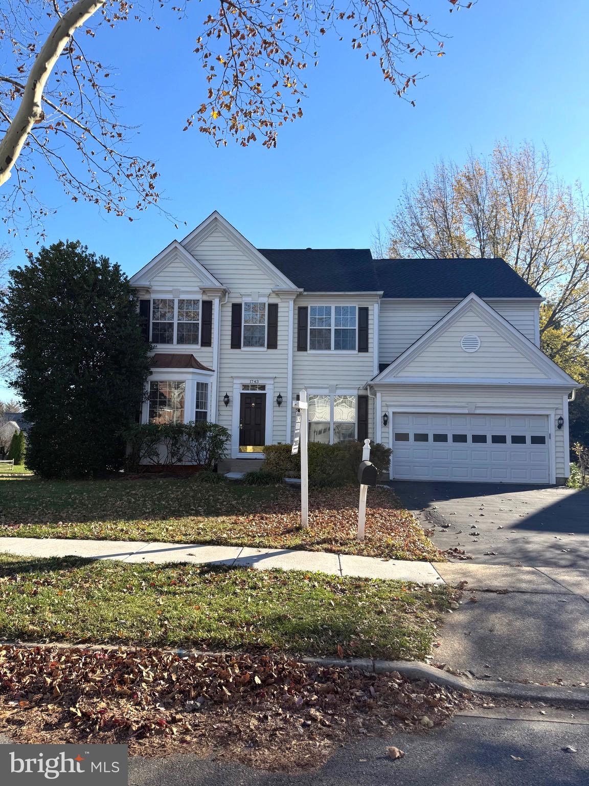 1743 Wheyfield Drive Frederick, MD 21701 - Photo 1 of 47 a front view of a house with a yard