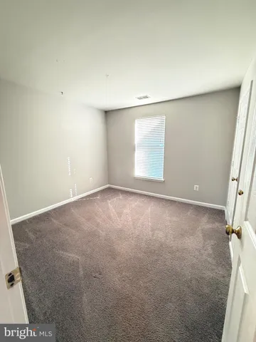 an empty room with a door