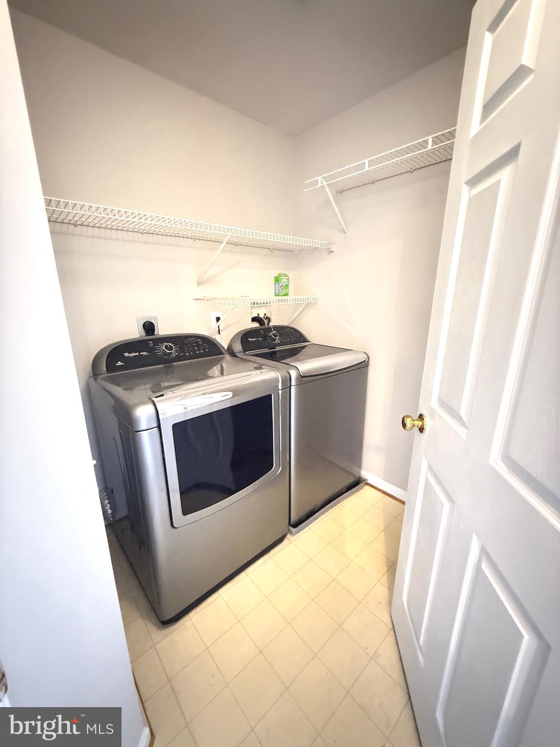1743 Wheyfield Drive Frederick, MD 21701 - Photo 30 of 47 a utility room with washer and dryer