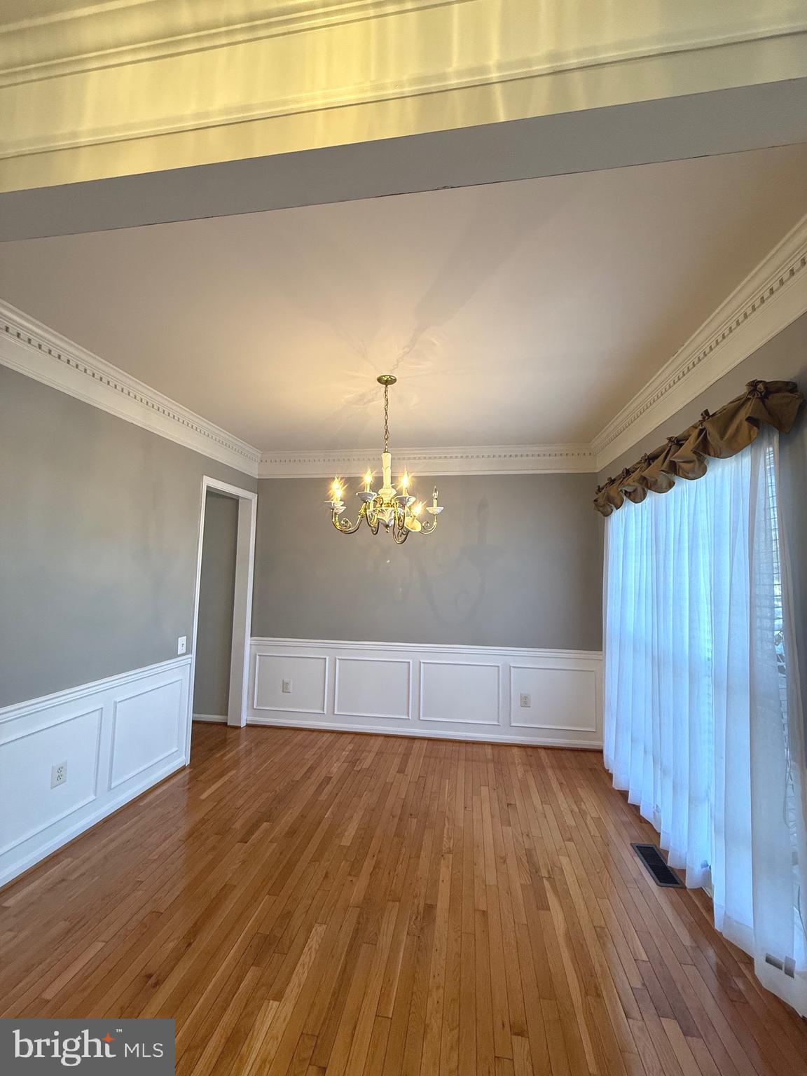 1743 Wheyfield Drive Frederick, MD 21701 - Photo 4 of 47 a view of empty room with wooden floor and fan