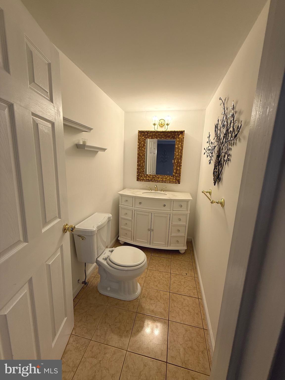 1743 Wheyfield Drive Frederick, MD 21701 - Photo 45 of 47 a bathroom with a toilet a sink and a shower