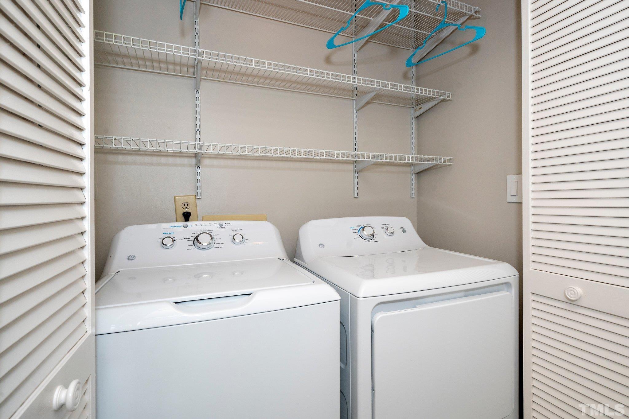 4353 Southwind Drive Raleigh, NC 27613 - Photo 12 of 23 a utility room with dryer and washer