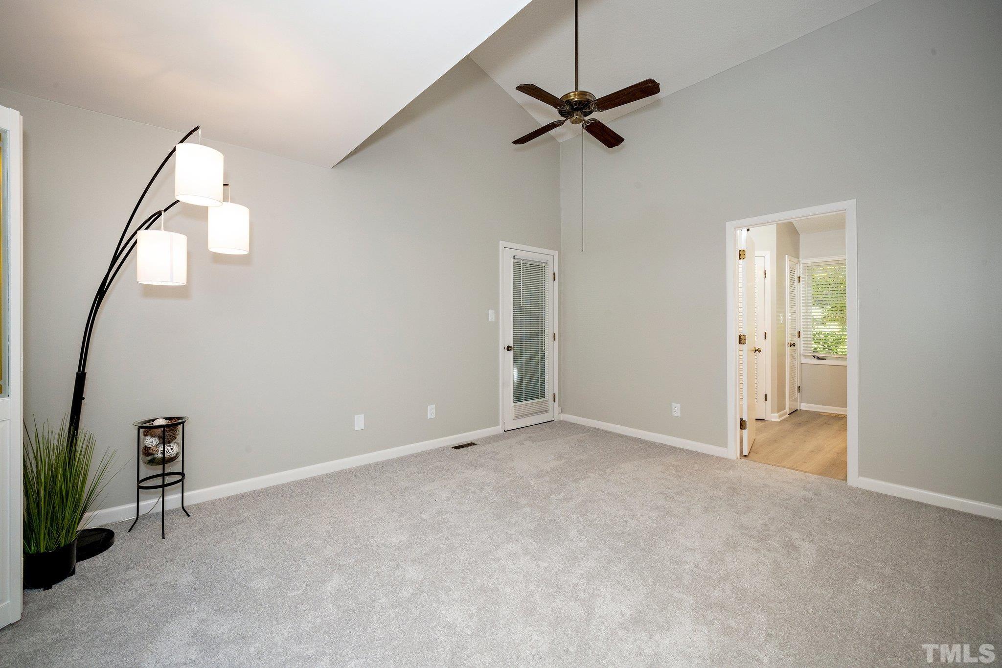 4353 Southwind Drive Raleigh, NC 27613 - Photo 15 of 23 a view of an empty room with a fan