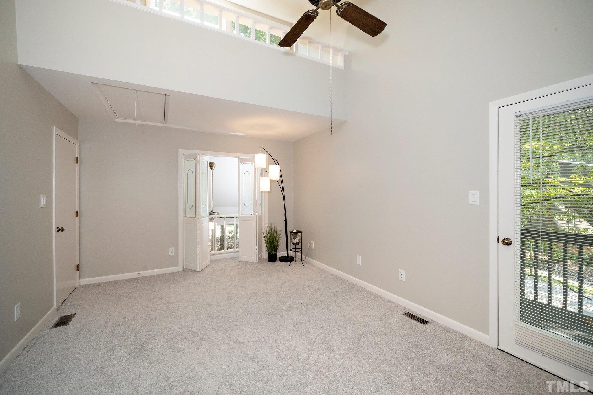 4353 Southwind Drive Raleigh, NC 27613 - Photo 16 of 23 a view of an empty room and a window