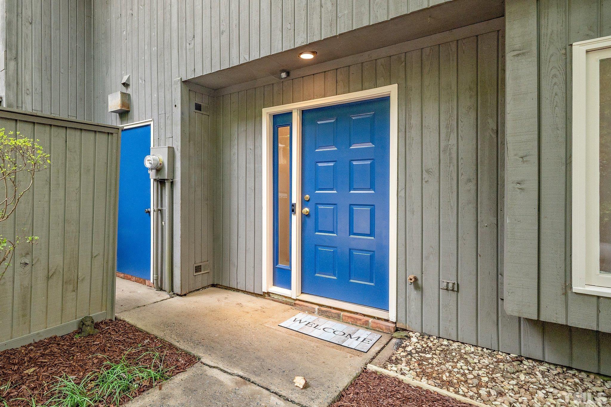 4353 Southwind Drive Raleigh, NC 27613 - Photo 3 of 23 a view of front door with yard