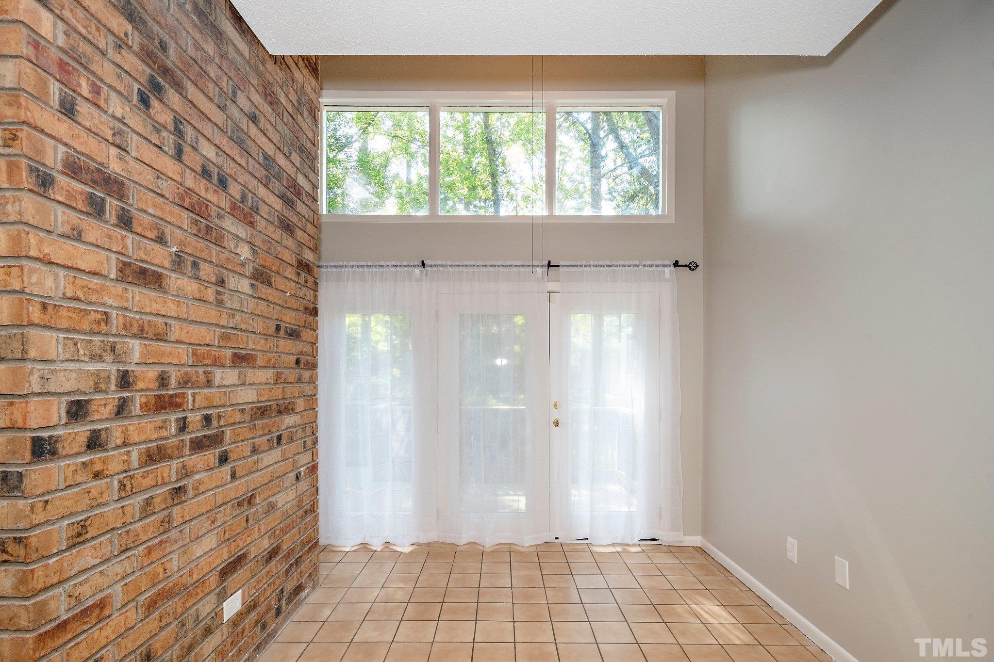 4353 Southwind Drive Raleigh, NC 27613 - Photo 7 of 23 a view of a bathroom with a shower