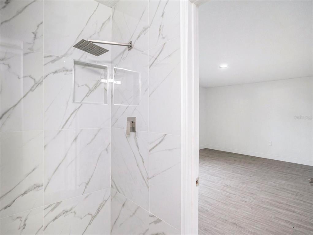 5136 Colbert Road Lakeland, FL 33812 - Photo 14 of 28 en empty room with wooden floor