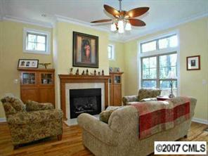 4252 Castleton Road Charlotte, NC 28211 - Photo 3 of 8 a living room with furniture and a fireplace