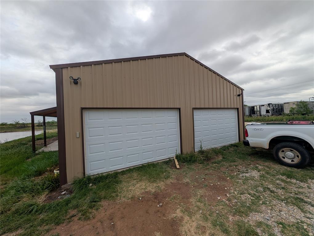 613 North Access Road Merkel, TX 79536 - Photo 4 of 11 a house view with a backyard space
