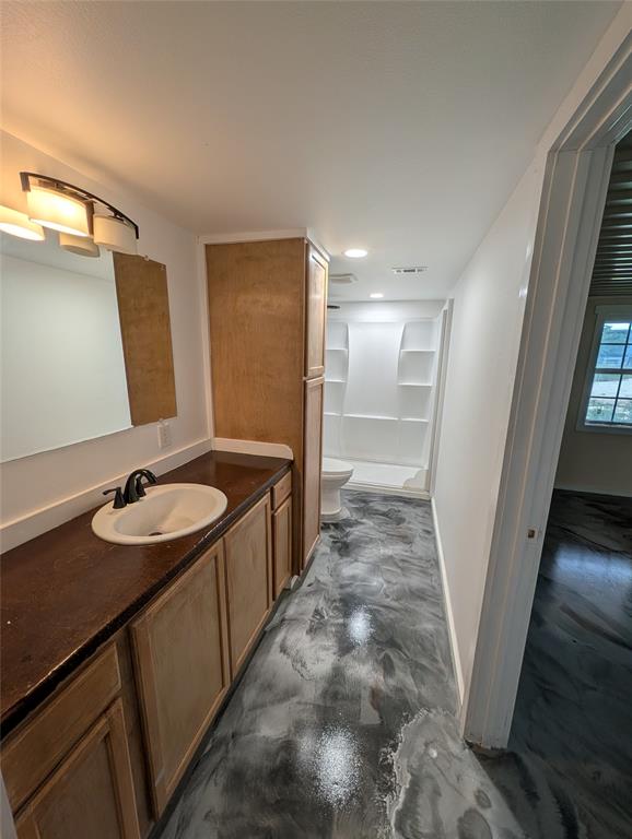 613 North Access Road Merkel, TX 79536 - Photo 7 of 11 a bathroom with a sink and a mirror