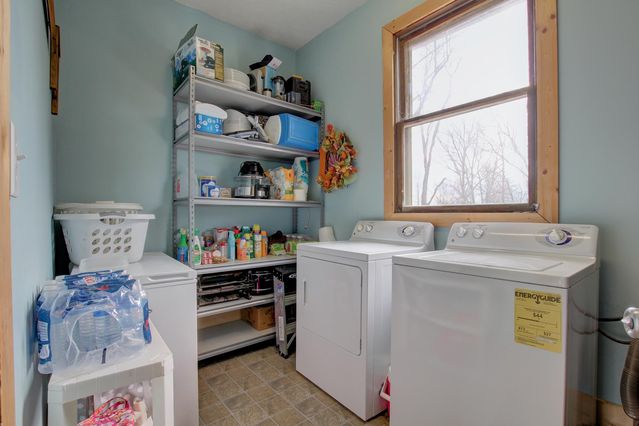35 Locust Road Erin, TN 37061 - Photo 14 of 20 a room with storage and utility