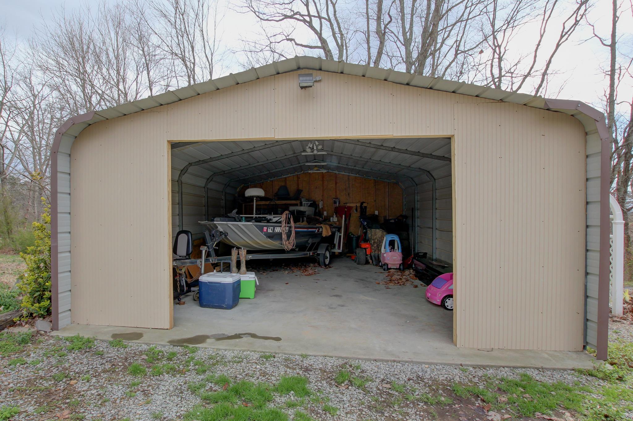 35 Locust Road Erin, TN 37061 - Photo 18 of 20 a view of a car in garage