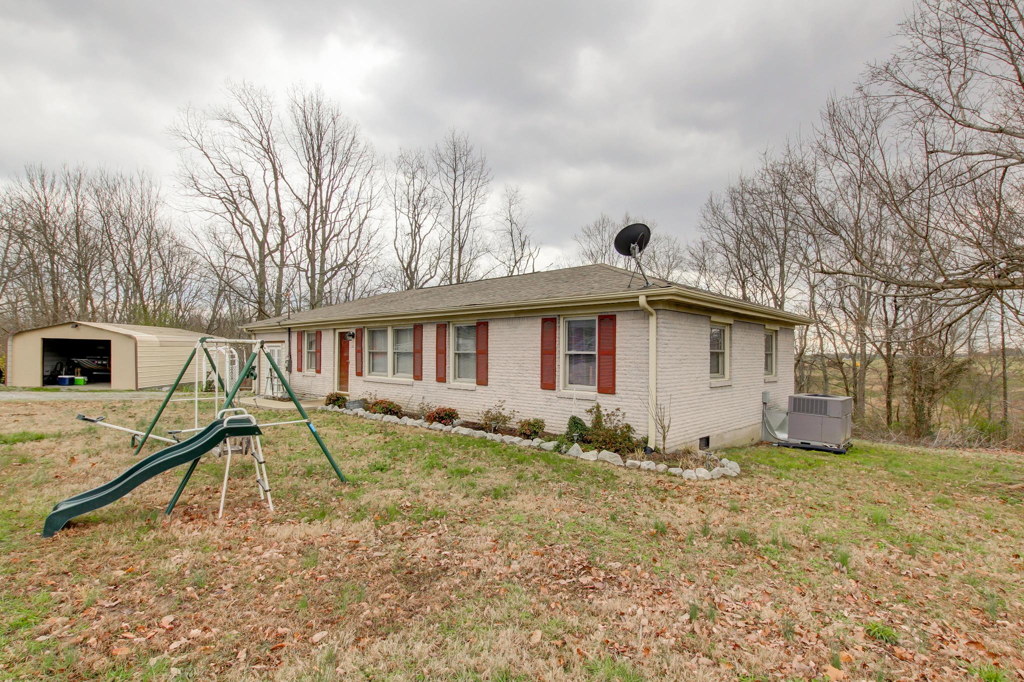 35 Locust Road Erin, TN 37061 - Photo 20 of 20 a view of a house with a yard