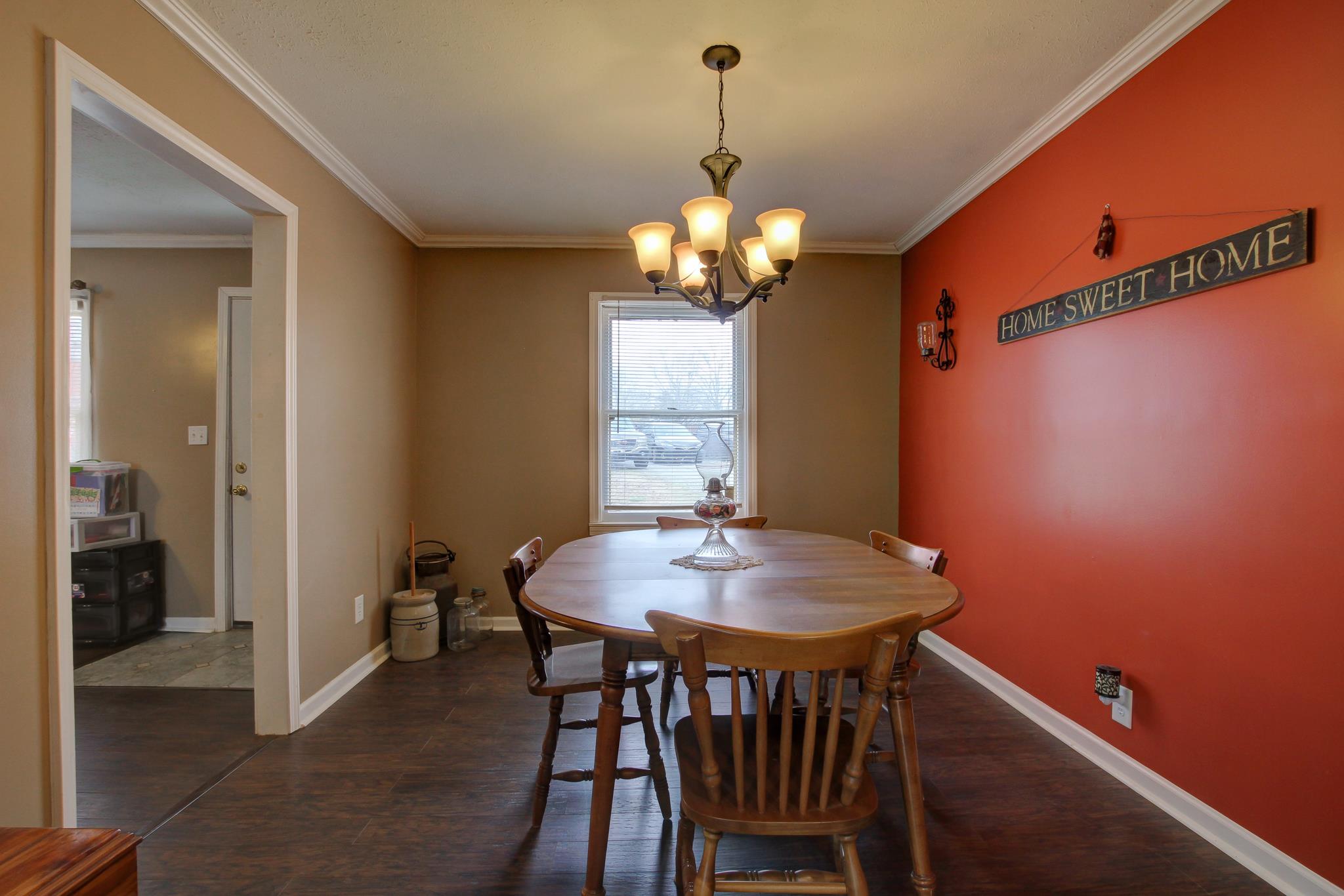 35 Locust Road Erin, TN 37061 - Photo 3 of 20 a view of a dining room with furniture window and wooden floor
