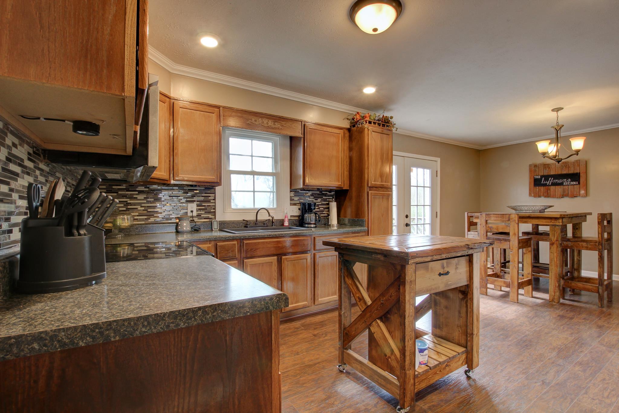 35 Locust Road Erin, TN 37061 - Photo 5 of 20 a kitchen with lots of counter top space and appliances