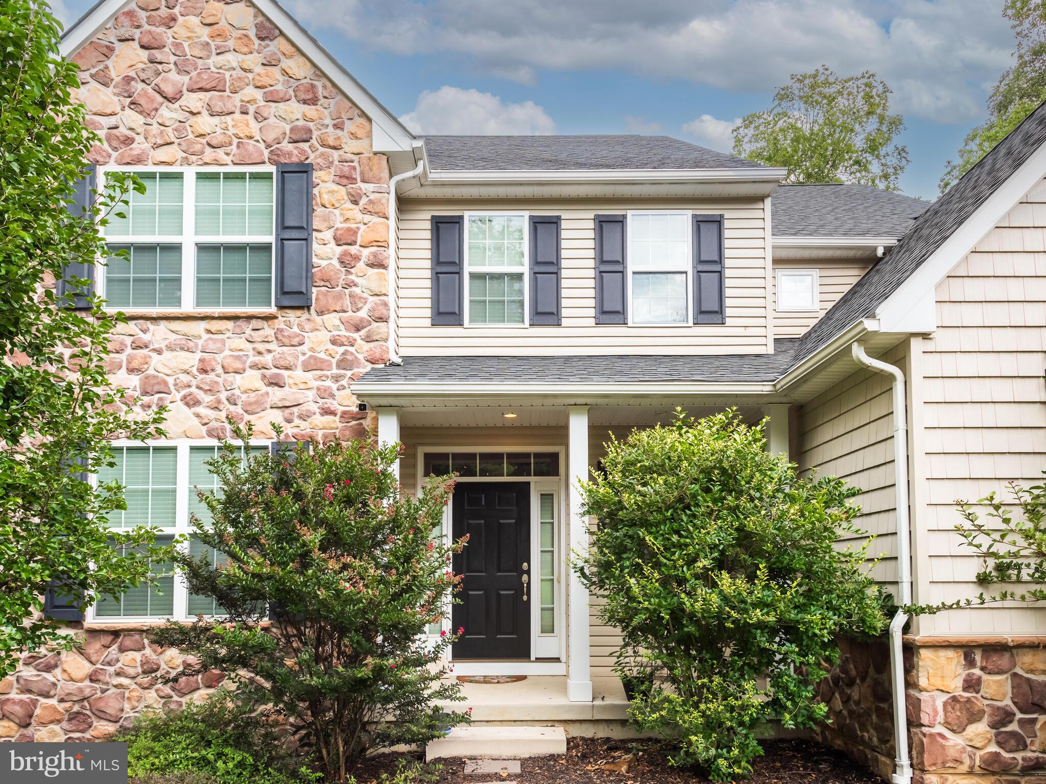 1718 Bethel Road Garnet Valley, PA 19060 - Photo 11 of 58 a front view of a house with plants
