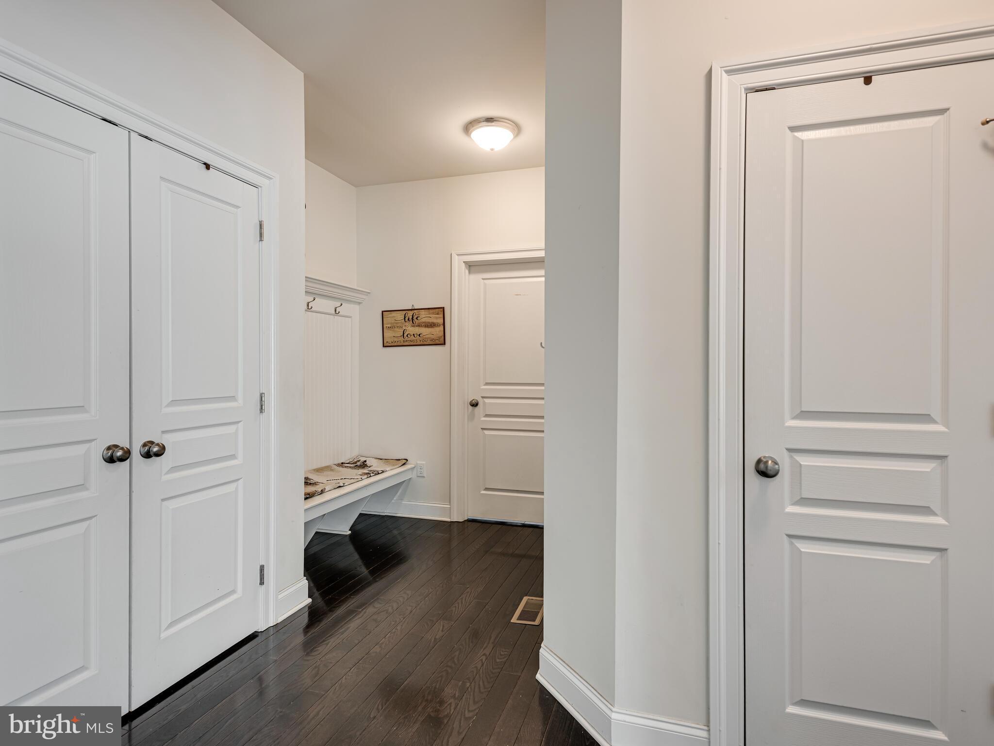 1718 Bethel Road Garnet Valley, PA 19060 - Photo 15 of 58 a view of a hallway with closet and wooden floor