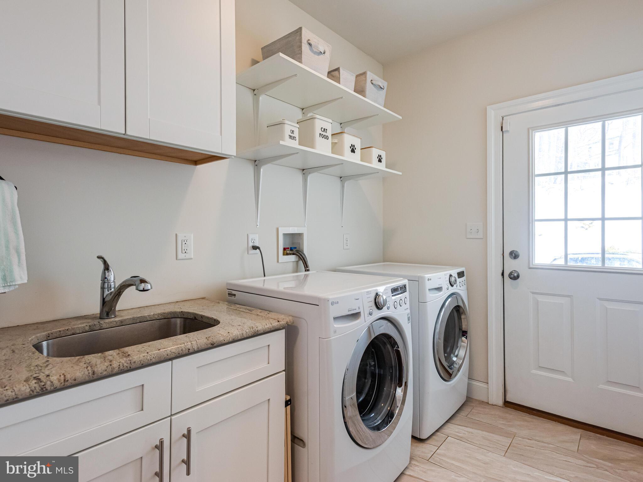 1718 Bethel Road Garnet Valley, PA 19060 - Photo 16 of 58 a utility room with sink dryer and washer