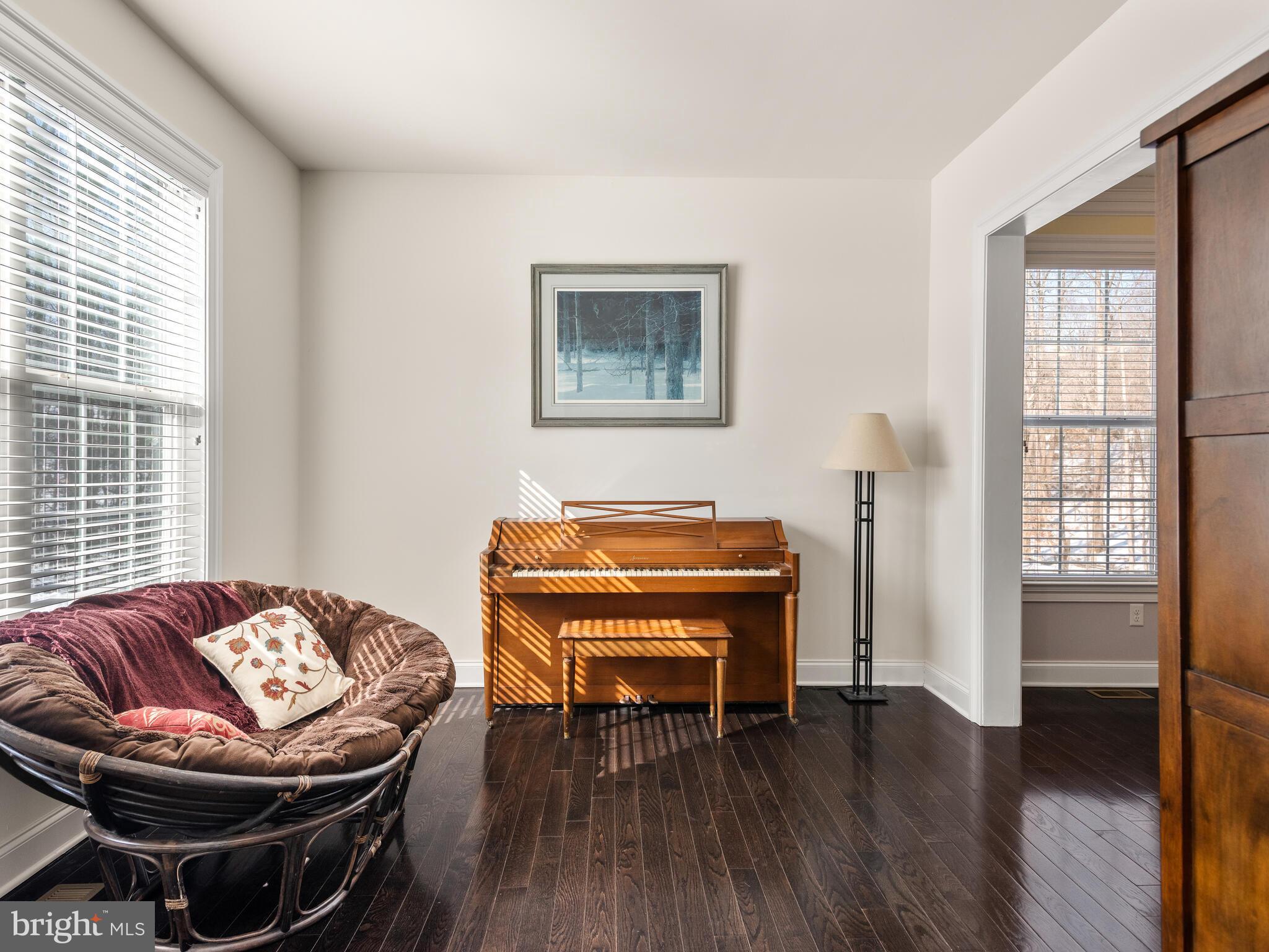 1718 Bethel Road Garnet Valley, PA 19060 - Photo 18 of 58 a living room with furniture and a piano