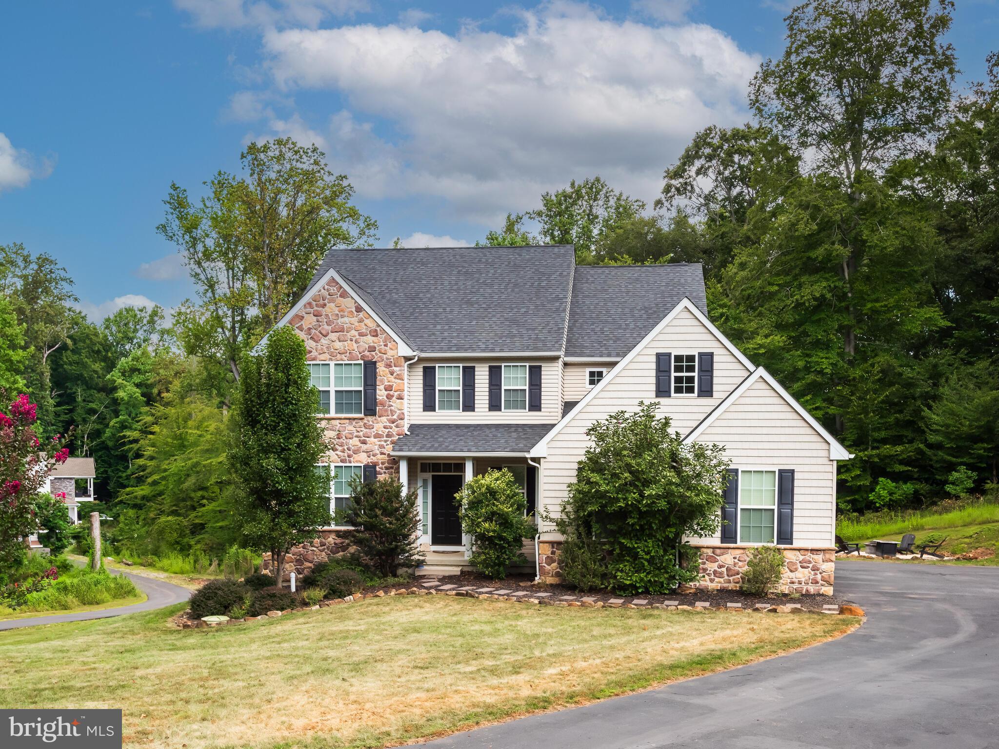 1718 Bethel Road Garnet Valley, PA 19060 - Photo 2 of 58 a view of a house with a yard and potted plants