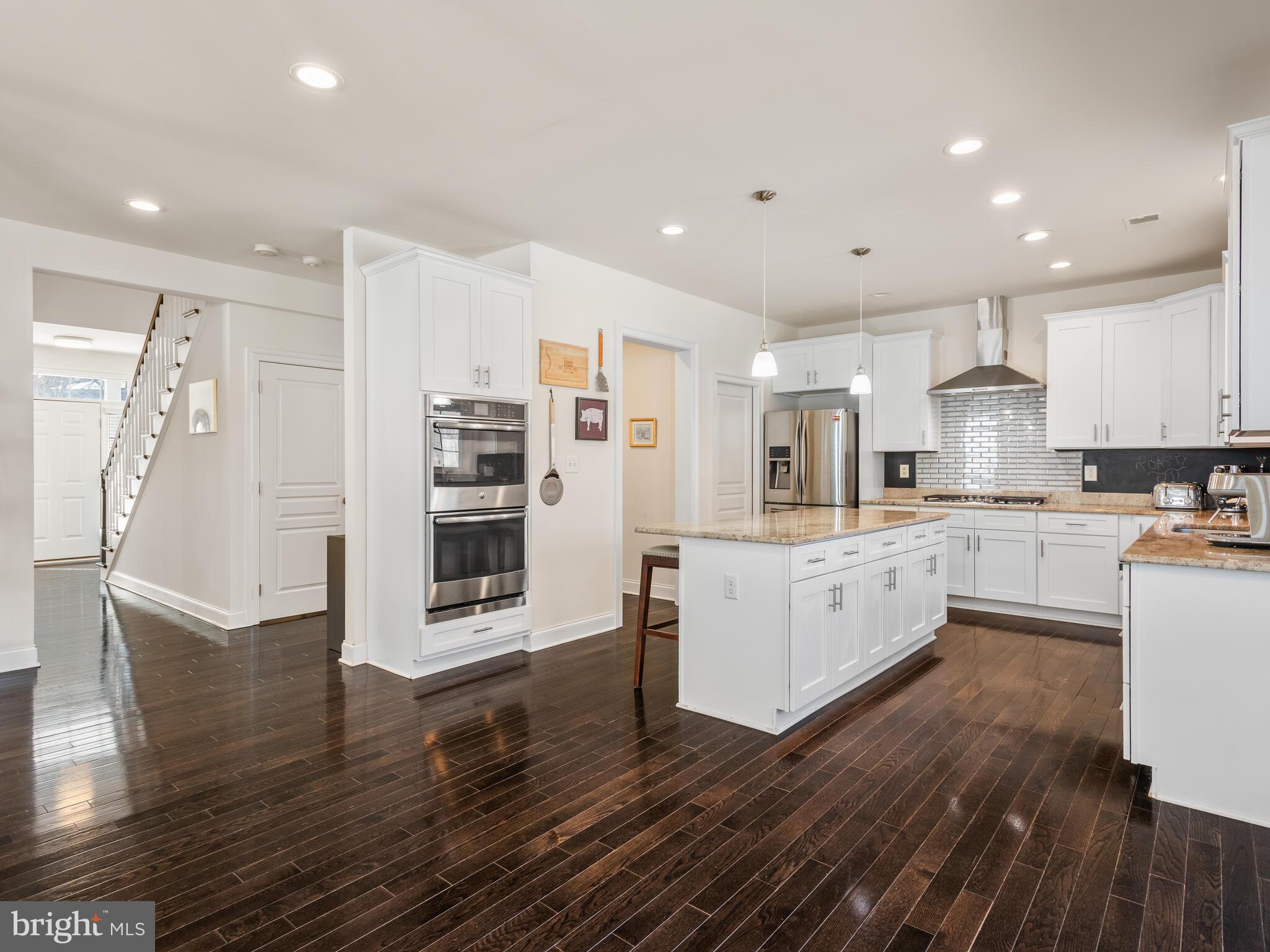 1718 Bethel Road Garnet Valley, PA 19060 - Photo 27 of 58 a large kitchen with stainless steel appliances granite countertop a large counter top a sink and a refrigerator