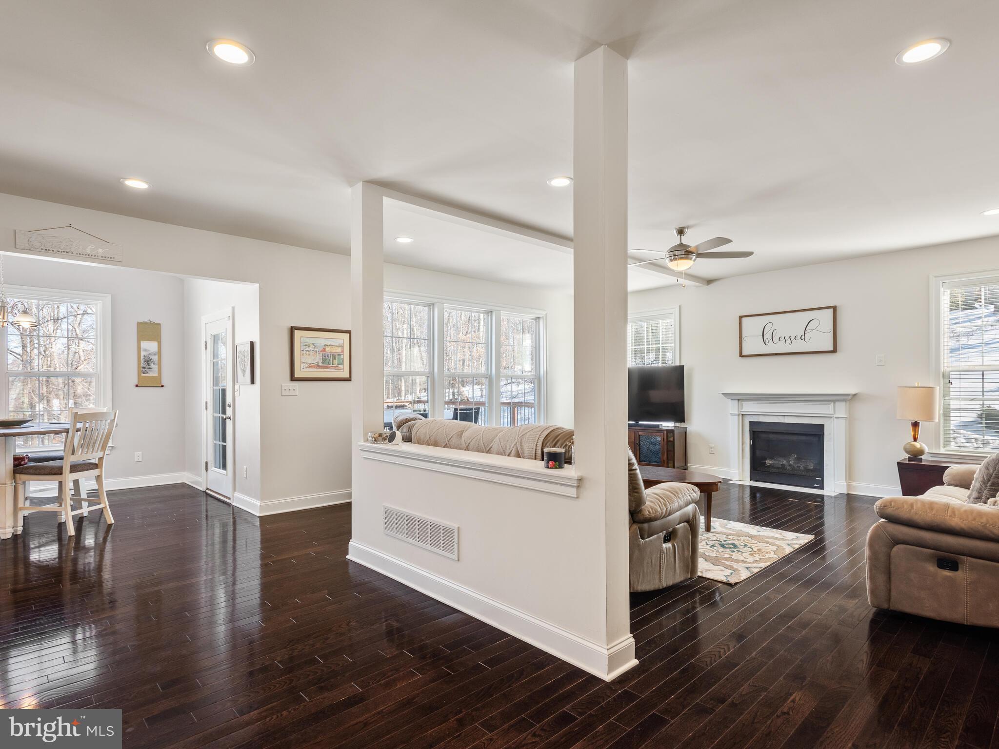 1718 Bethel Road Garnet Valley, PA 19060 - Photo 28 of 58 a living room with furniture and a fireplace