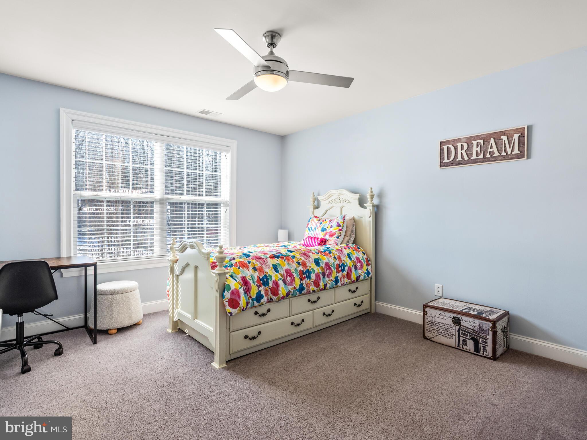 1718 Bethel Road Garnet Valley, PA 19060 - Photo 41 of 58 a bedroom with a bed chair and a window