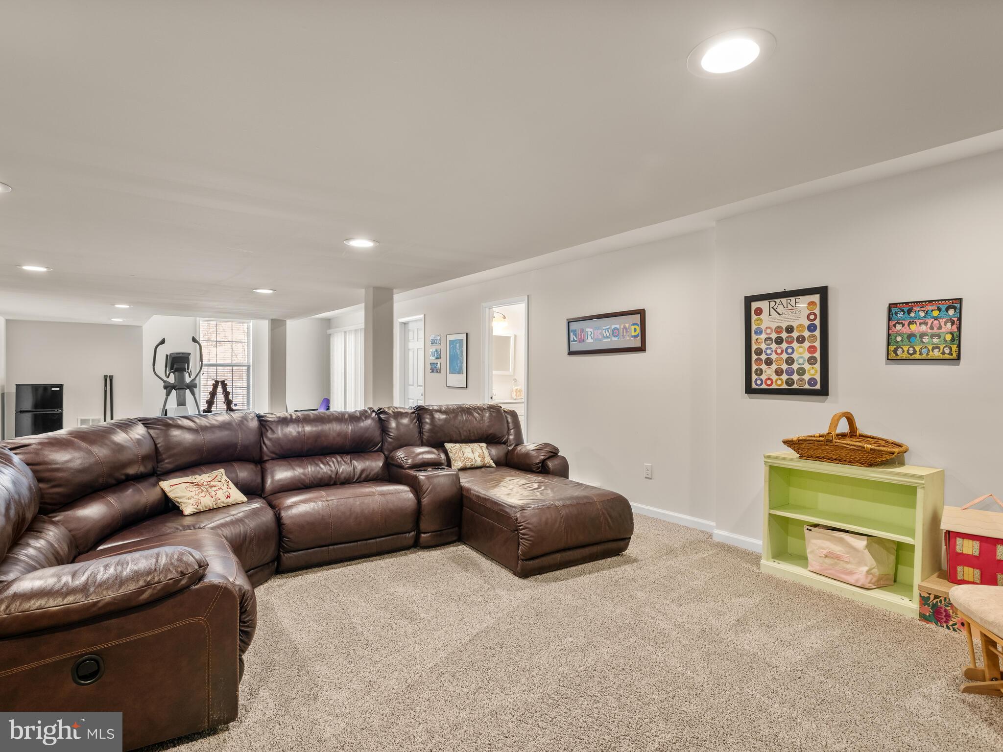 1718 Bethel Road Garnet Valley, PA 19060 - Photo 47 of 58 a living room with furniture and a wooden floor