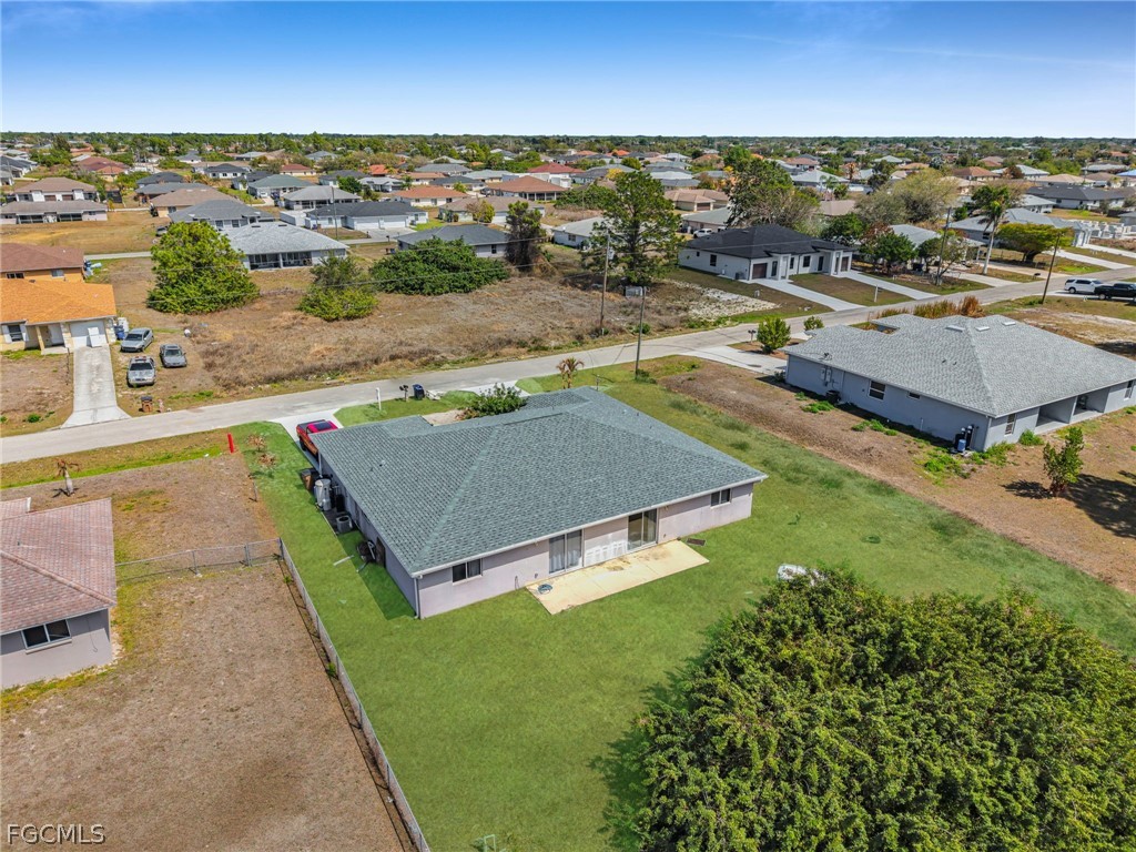 4549 22nd Street Southwest Lehigh Acres, FL 33973 - Photo 26 of 27 an aerial view of a house