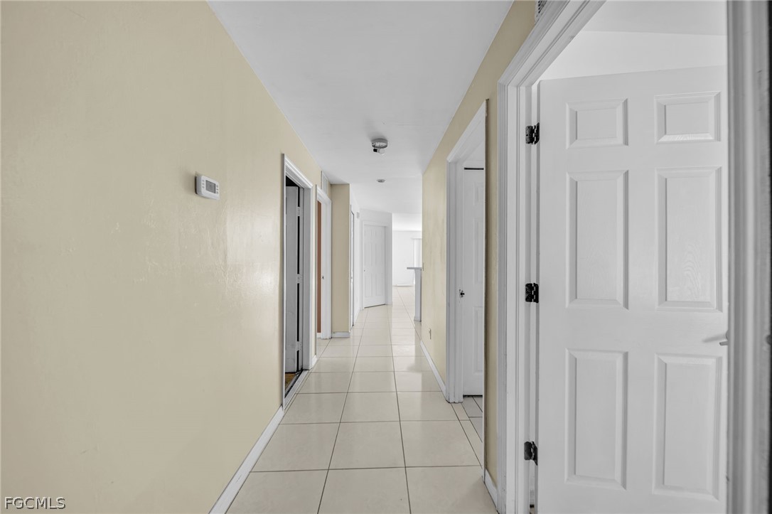 4549 22nd Street Southwest Lehigh Acres, FL 33973 - Photo 4 of 27 a view of a hallway