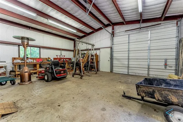a view of a garage with parked cars
