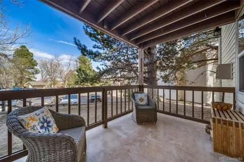 an aerial view of a house with yard