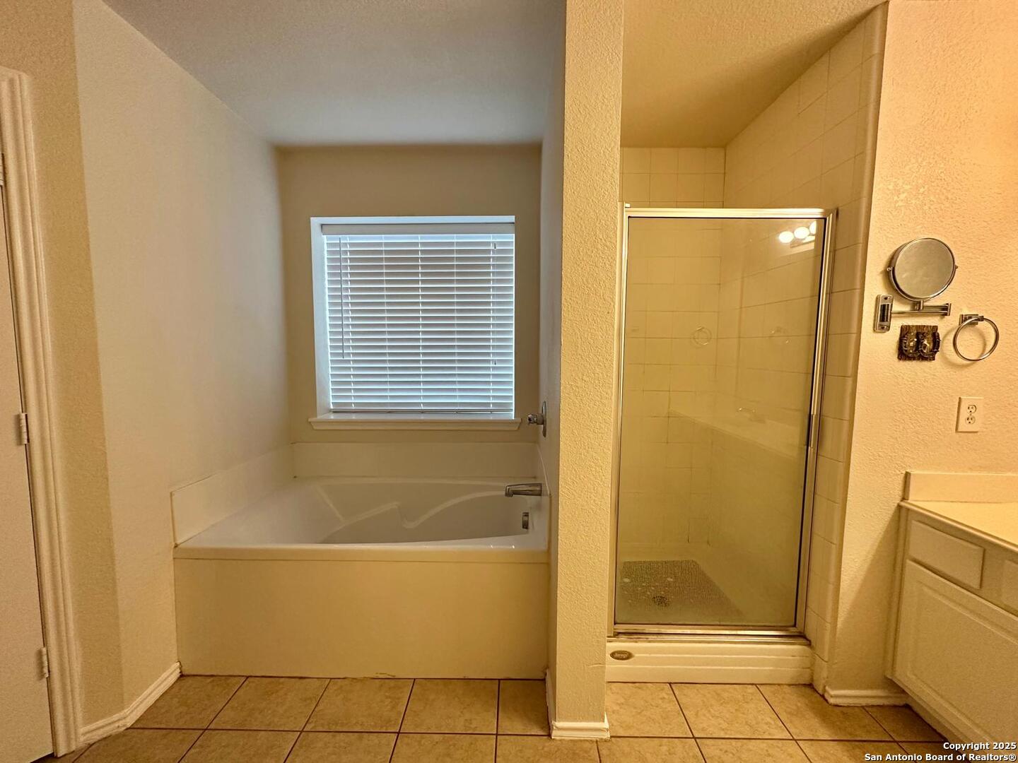 9414 Ingleton San Antonio, TX 78245 - Photo 8 of 17 a bathroom with a bathtub