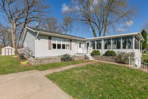 front view of a house with a yard