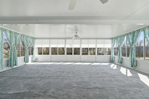 a view of room with wooden ceiling