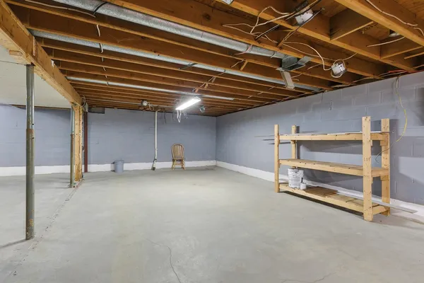 a view of a room with wooden walls