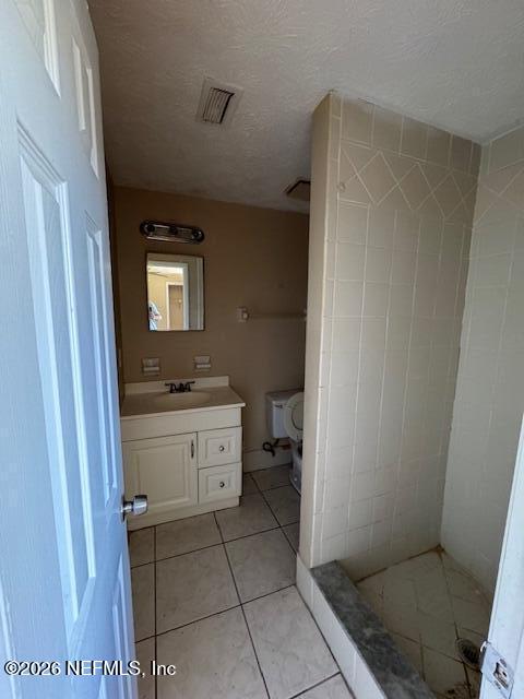 4368 Bedivere Road Jacksonville, FL 32208 - Photo 13 of 20 a bathroom with a sink a toilet and mirror